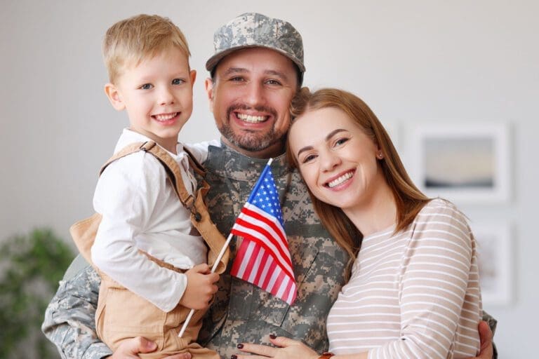 Featured image for Servicemembers Civil Relief Act – also called SCRA – showing a happy military family